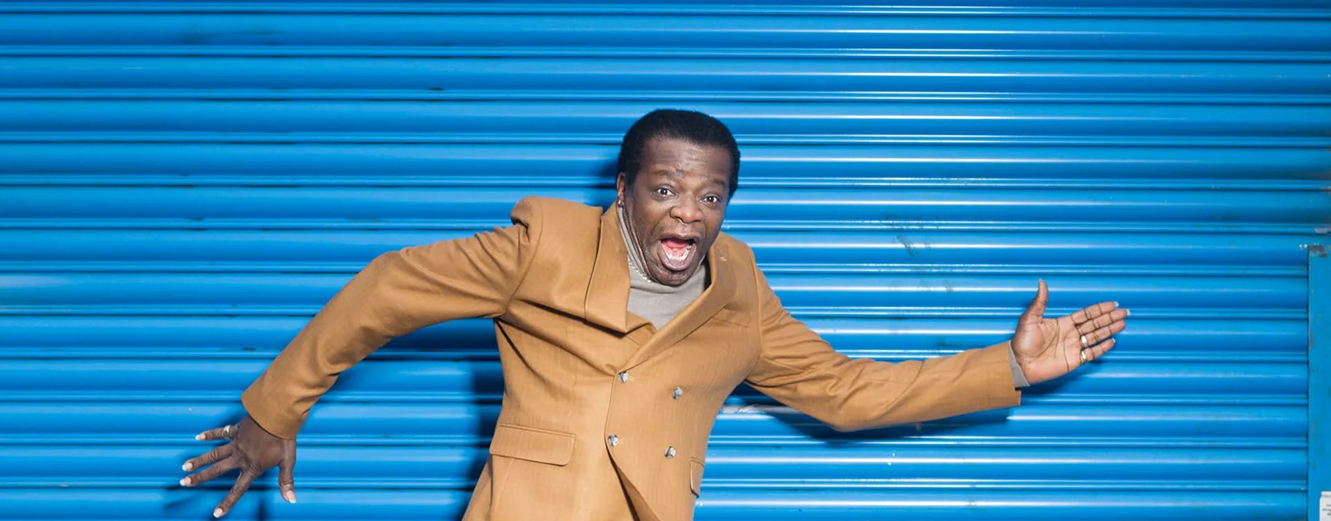STEPHEN K AMOS history banner